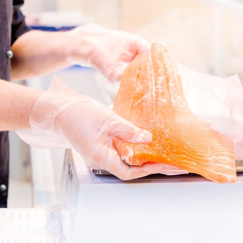 Seafood-Counter-Weighing-a-Salmon-Fillet-111.0090-